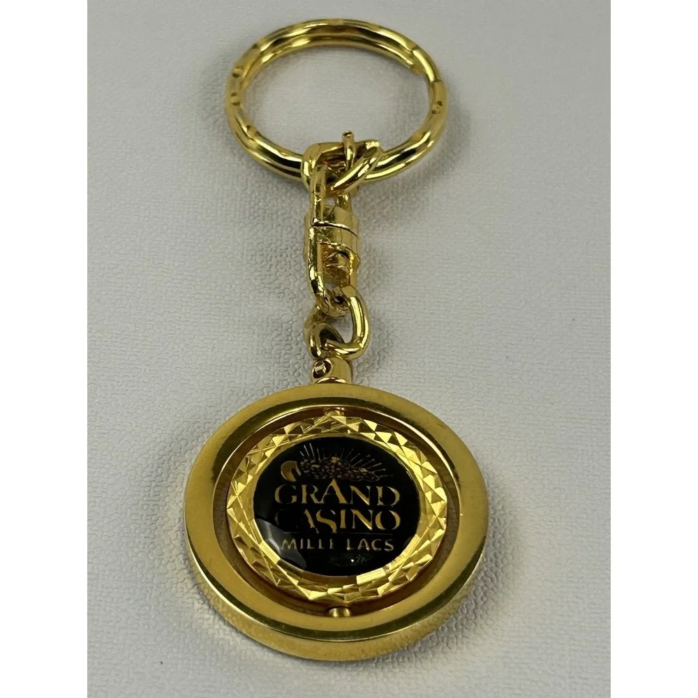 Vintage Grand Casino Mille Lacs Gold Tone Spinner Keychain Fob Souvenir